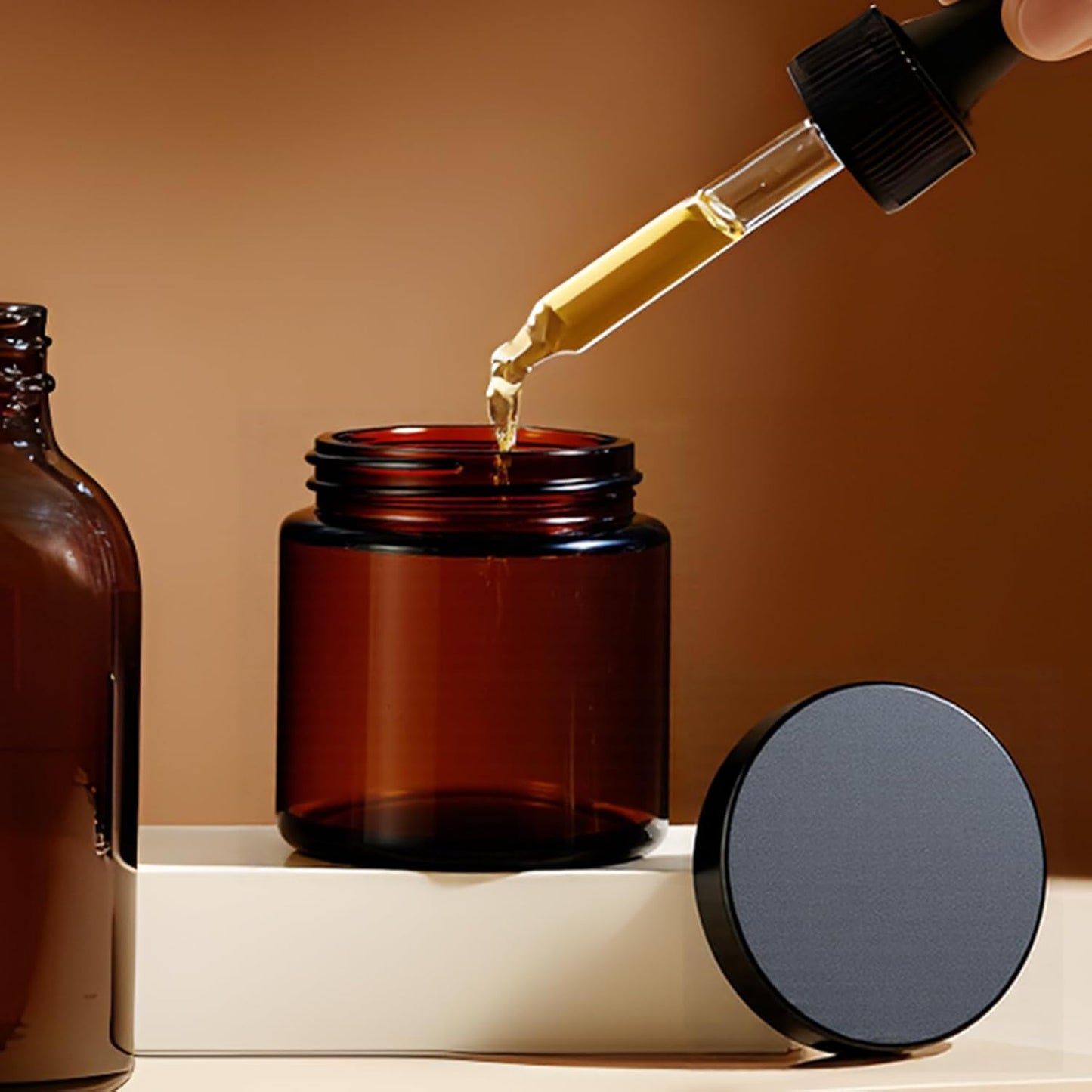 4 oz Glass Jars with Lids, Hoa Kinh 2 Pack Amber Small Glass Jars with Black Lids Empty Cosmetic Containers Airtight Round Glass Jar for Lotions, Powders and Ointments