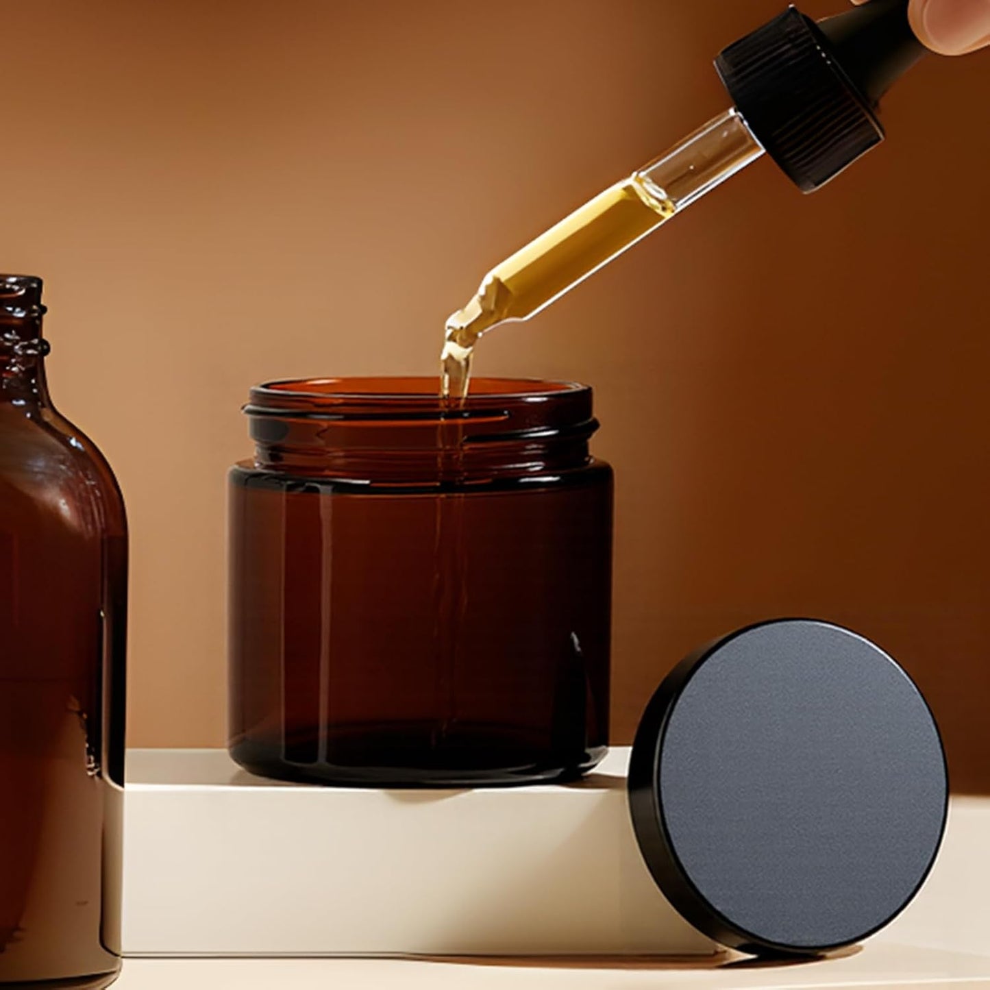 2oz Jars with Lids, HOA Kinh 3 Pack Amber Glass Jars with Lids Empty Cosmetic Containers Round Airtight Glass Jar with Black Lid for Storing Lotions Powders Ointments